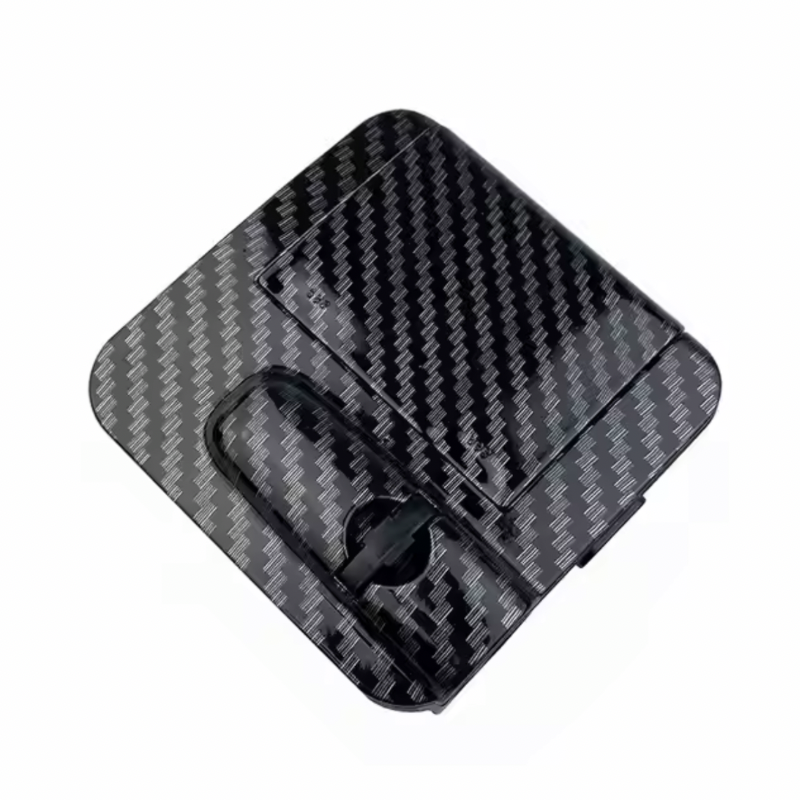 Projecteur de logo de voiture Dryyver LightDoor™ avec une finition en carbone, ajoutant une touche sportive et sophistiquée à votre véhicule.