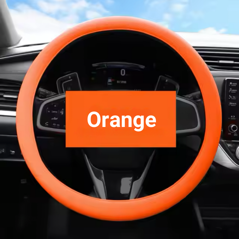 Couvre-volant dryyver-ecogrip en silicone de couleur orange installé sur le volant d’une voiture, offrant une apparence élégante et moderne.