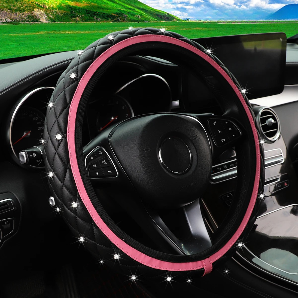 Dryyver Vibe™ CrystalEdge avec contour rose pastel, cuir noir texturé et finition brillante en strass.