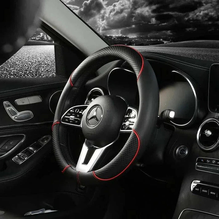 Couvre-volant Dryyver Zen™ Touch noir avec surpiqûres rouges installé sur volant Mercedes
