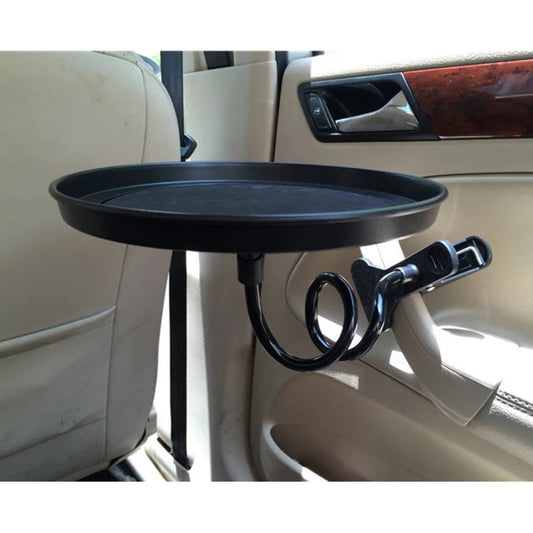 Table Dryyver FlexTable™ fixée sur la portière arrière pour un repas pratique en voiture.