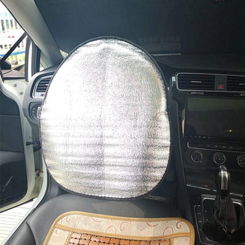 Réflecteur solaire Dryyver SunBlocker™ installé sur le volant pour maintenir une température agréable