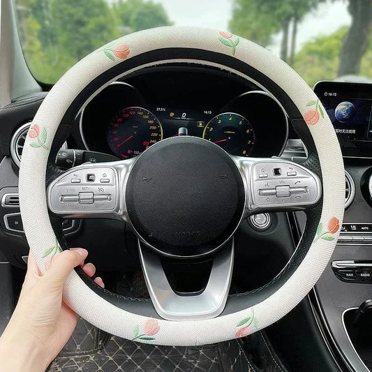 Couvre-volant Dryyver Vibe™ en tissu brodé avec fleurs de tulipes – prise en main douce et look printanier original.