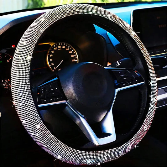 Brillance éclatante du Dryyver Vibe™ GlamShine diamond edition en lumière naturelle sur volant moderne.
