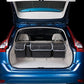 Dryyver TrunkTidy™ installé dans le coffre d’une voiture, offrant une solution de rangement pratique et efficace pour optimiser l’espace.